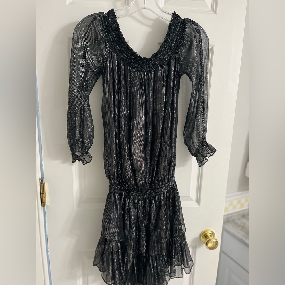 Never fit me right. Tags removed but never worn. Great dress